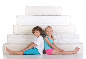 Children and many mattresses